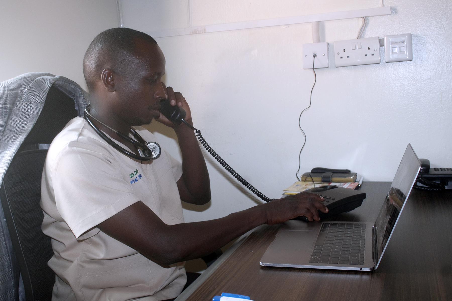 General practitioner at Family Clinic during a consultation